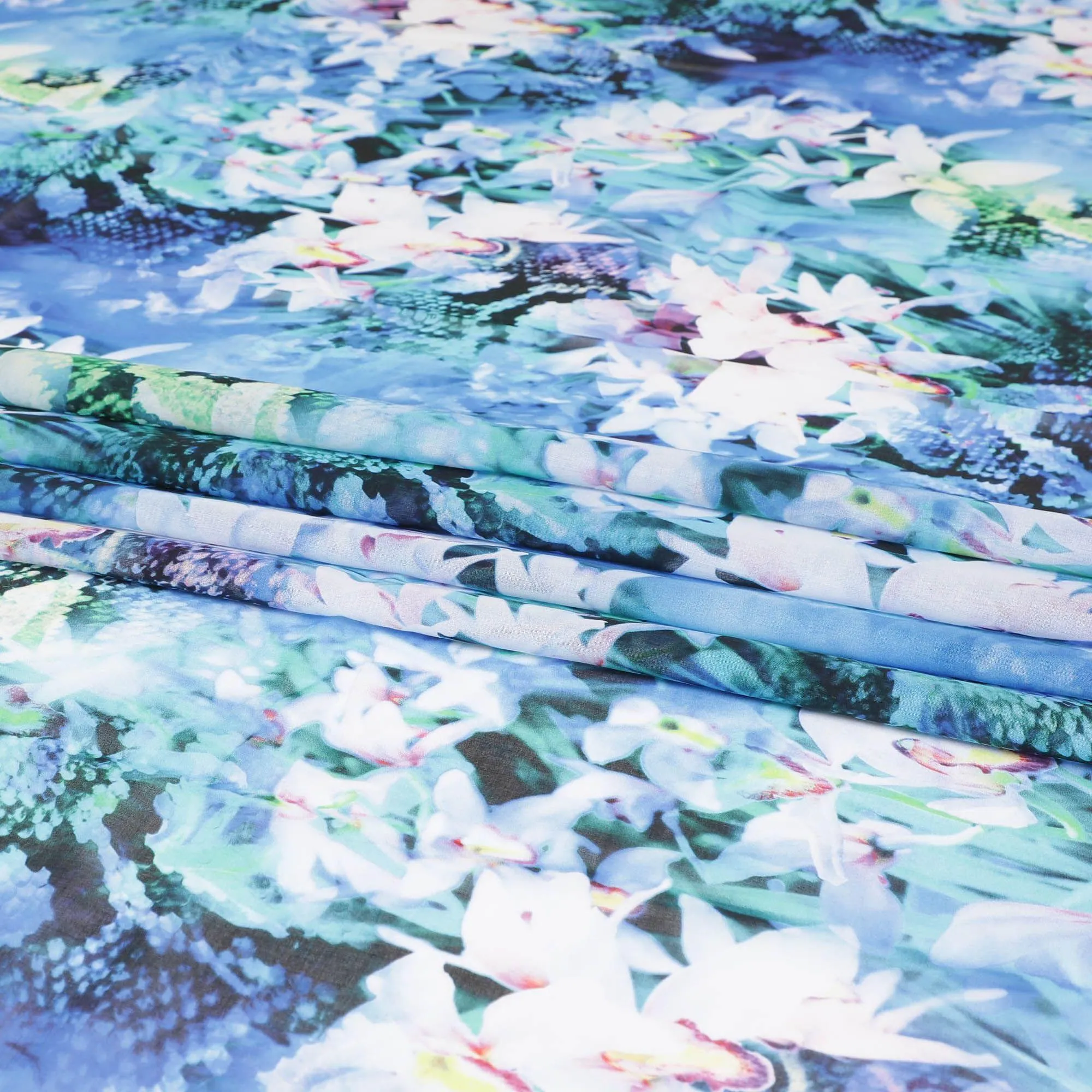 Baby blue Swiss 100% cotton voile fabric with off white, turquoise blue, bottle green and neon green print in floral design-D7215