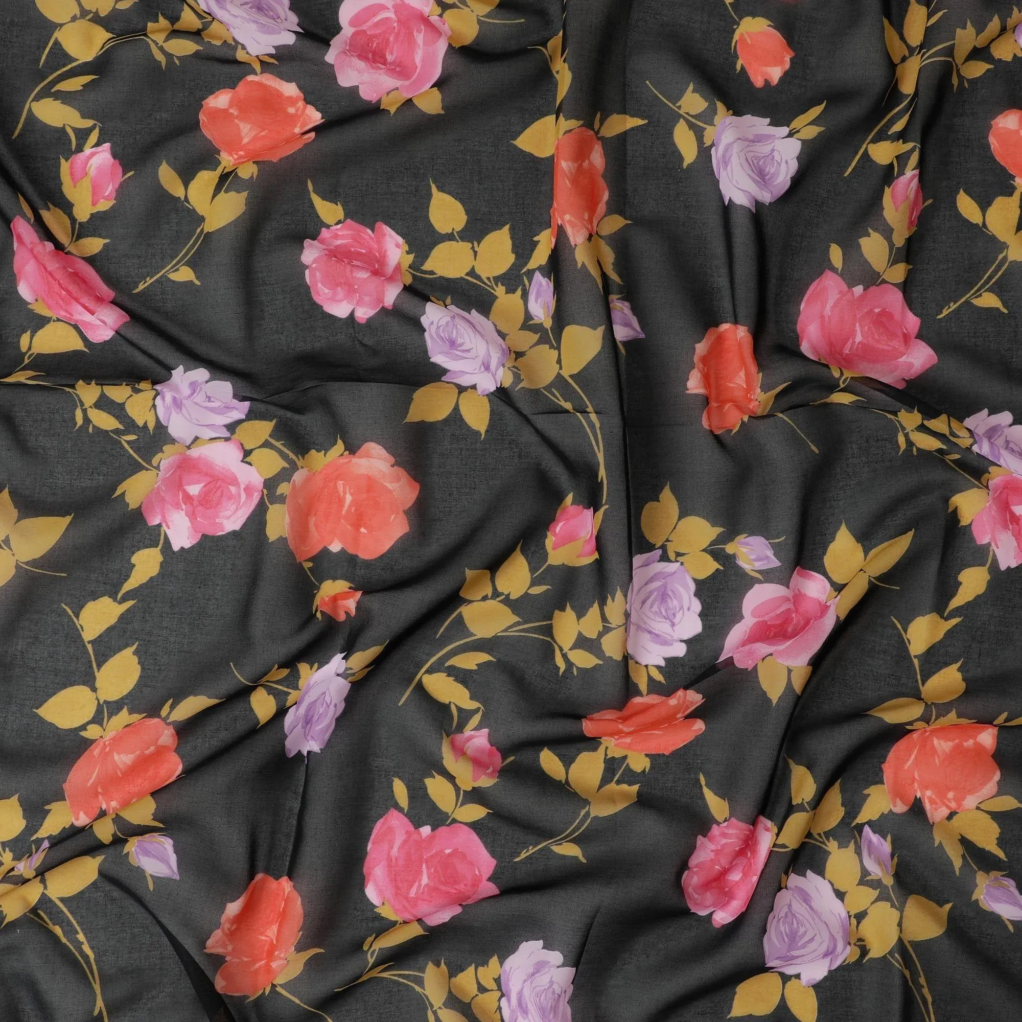 Black Swiss cotton voile fabric with gold, creamy pink and lilac print in floral design